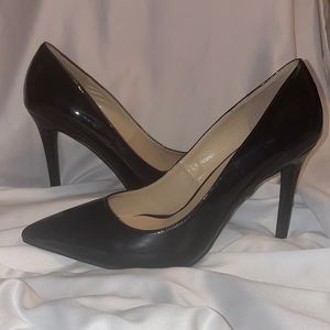 Black heel. Worn once.